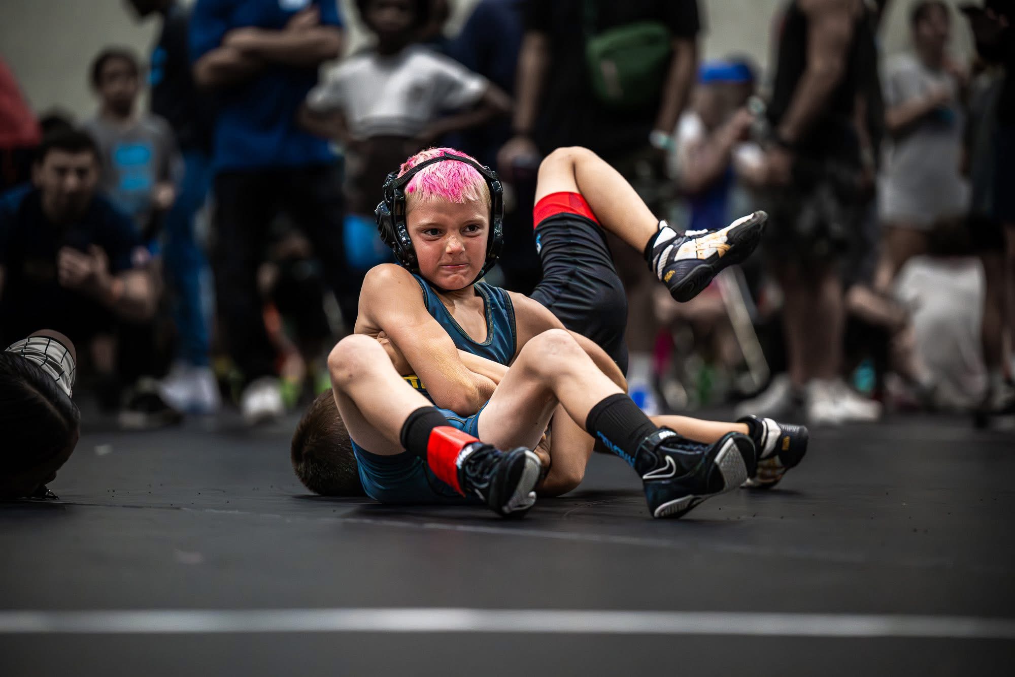 Ascend wrestler competing at a tournament