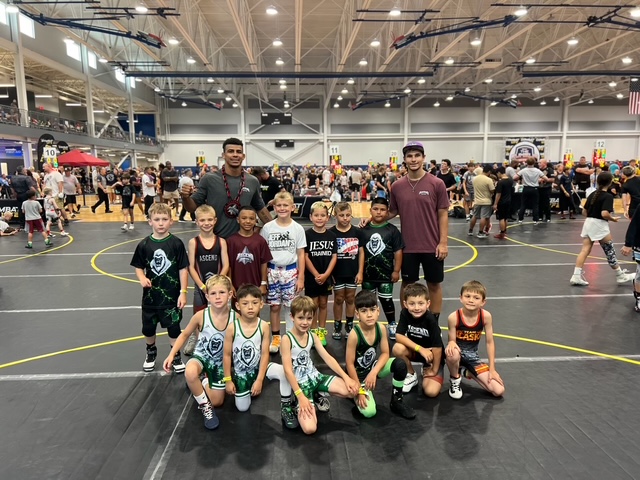 Ascend youth team with coaches at a tournament